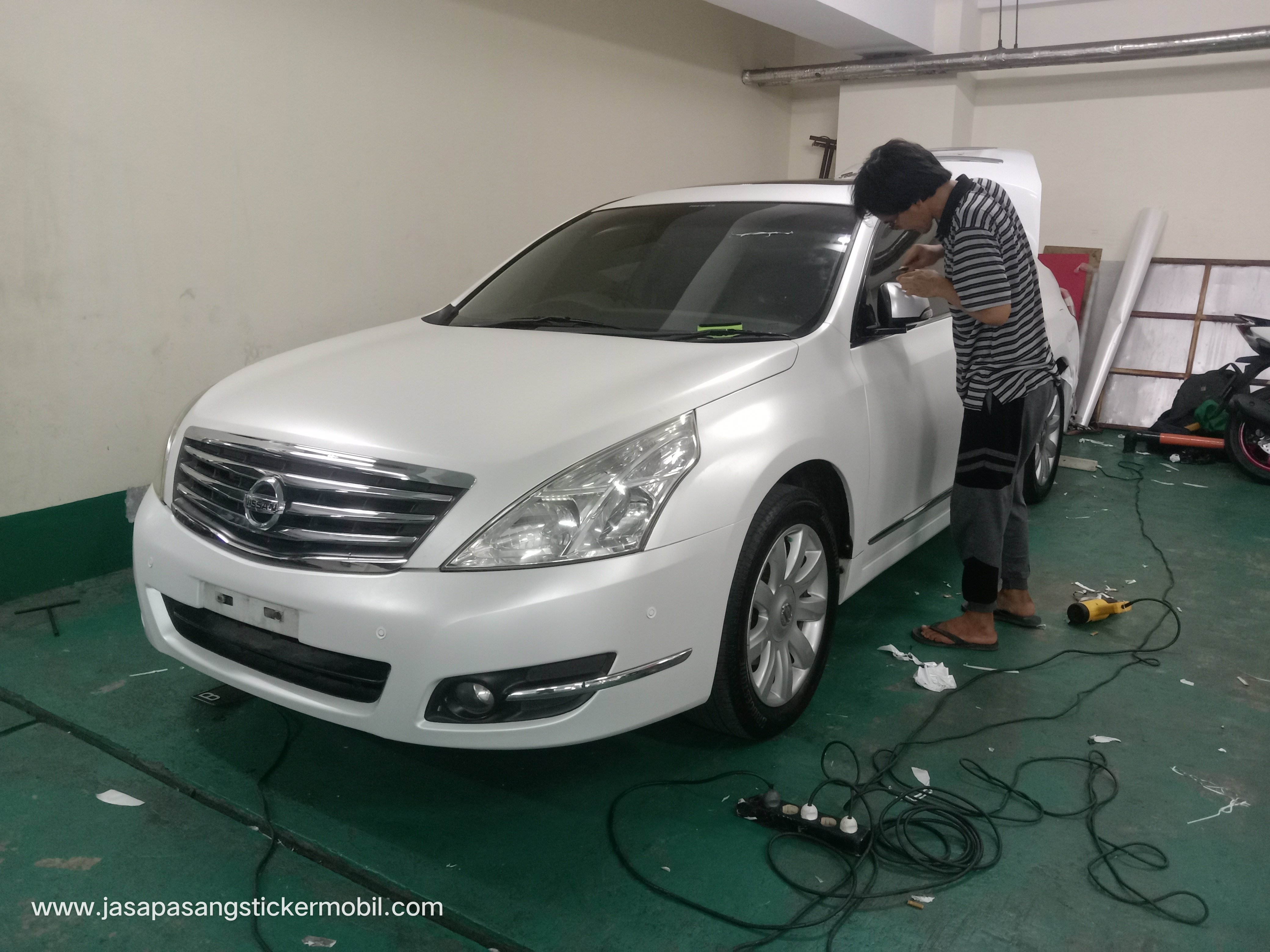 Jasa pasang wrapping sticker mobil