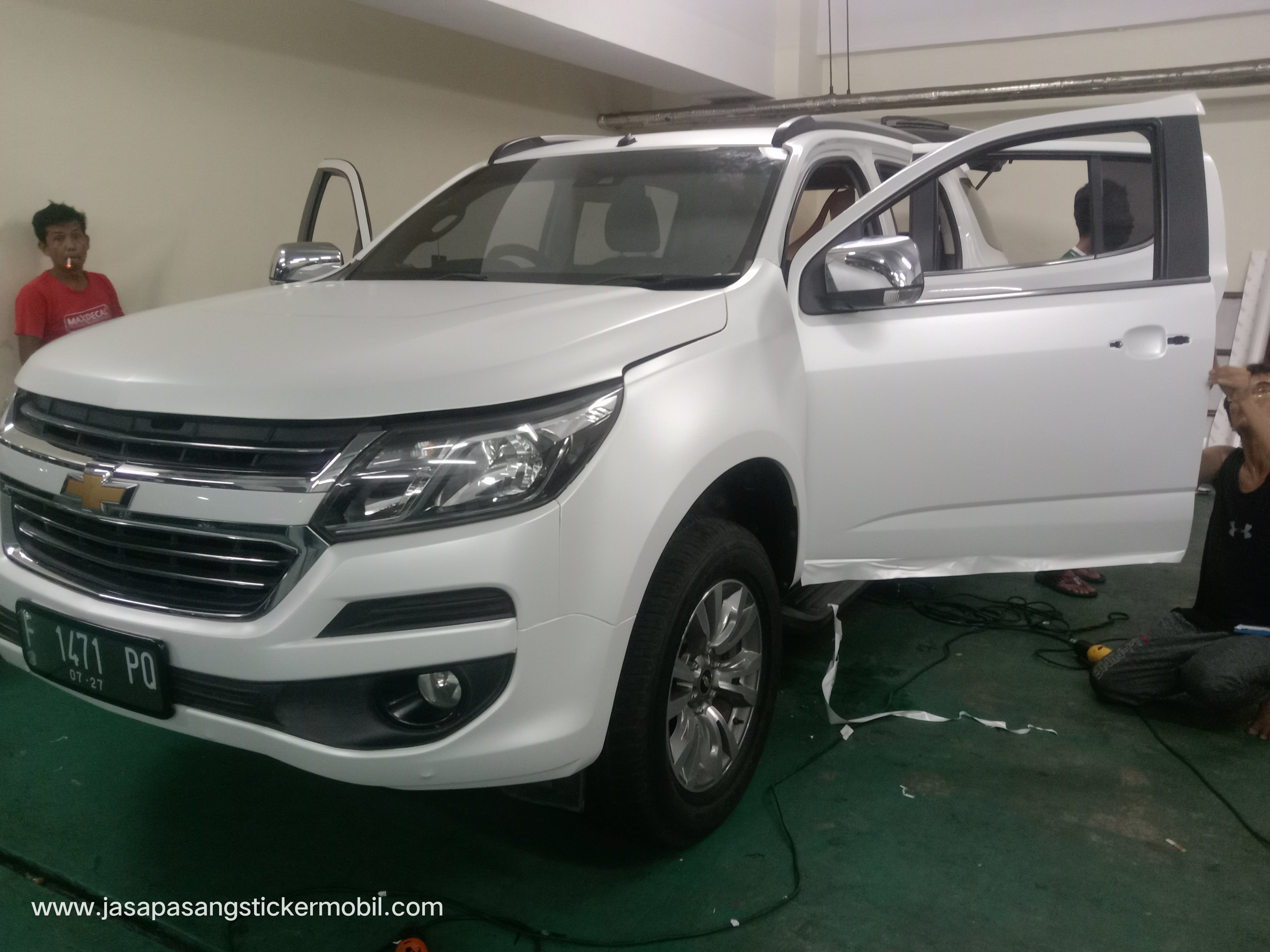 Wrapping Mobil Cempaka Putih