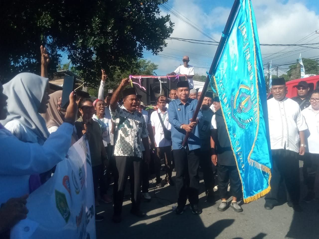 Pawai Ta'aruf Musabaqoh Tilawatil Qur'an ( MTQ ) ke -30 tingkat kecamatan Baguala .